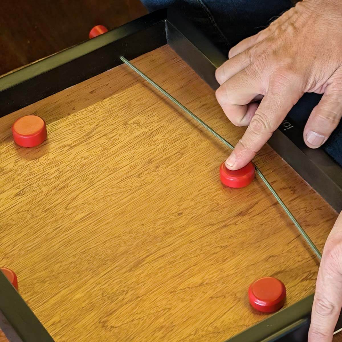 Juego Sling Puck - Pucket