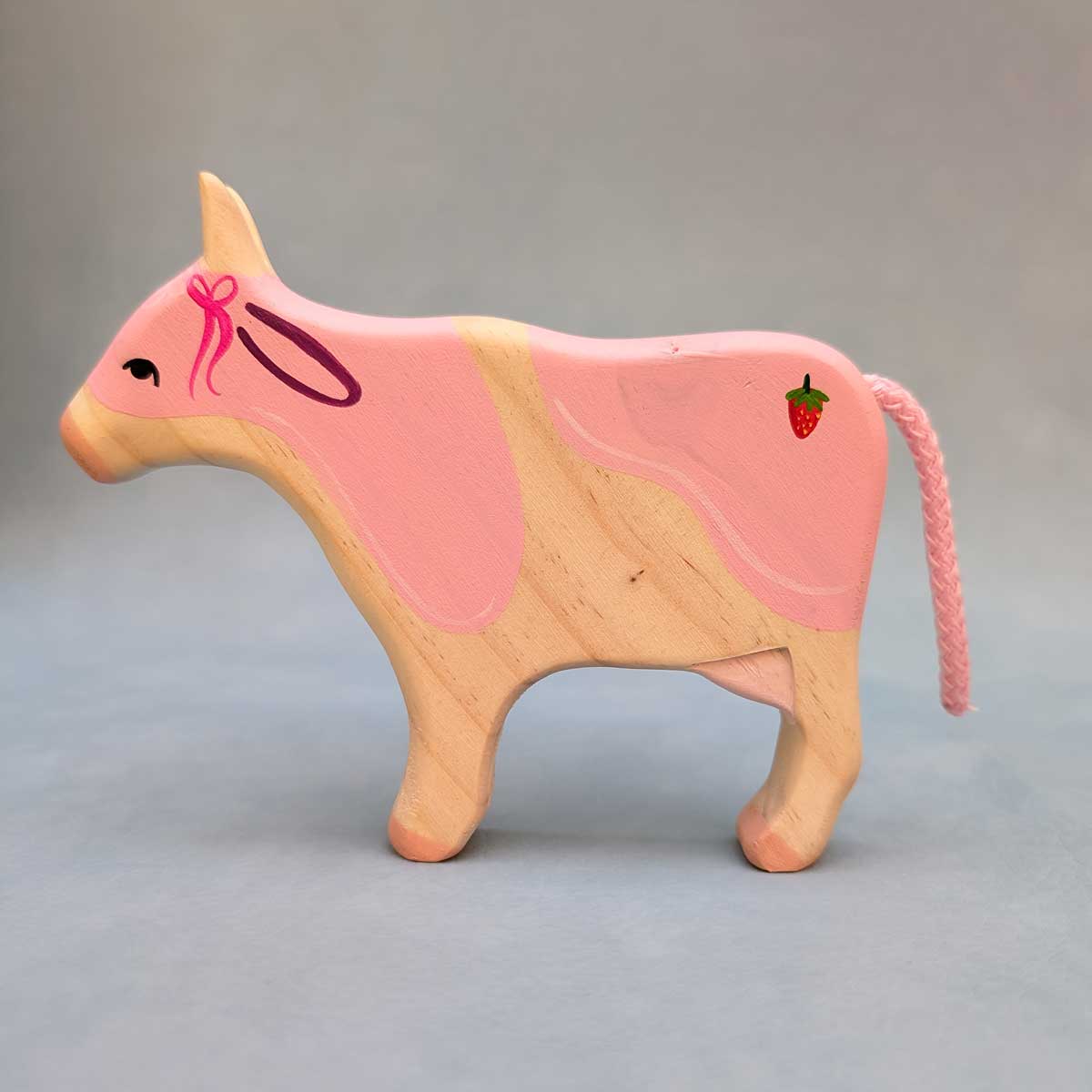 Vaca de madera, color de manchas rosa, juguete Montessori artesanal para estimular la imaginación infantil. Vaca coquette